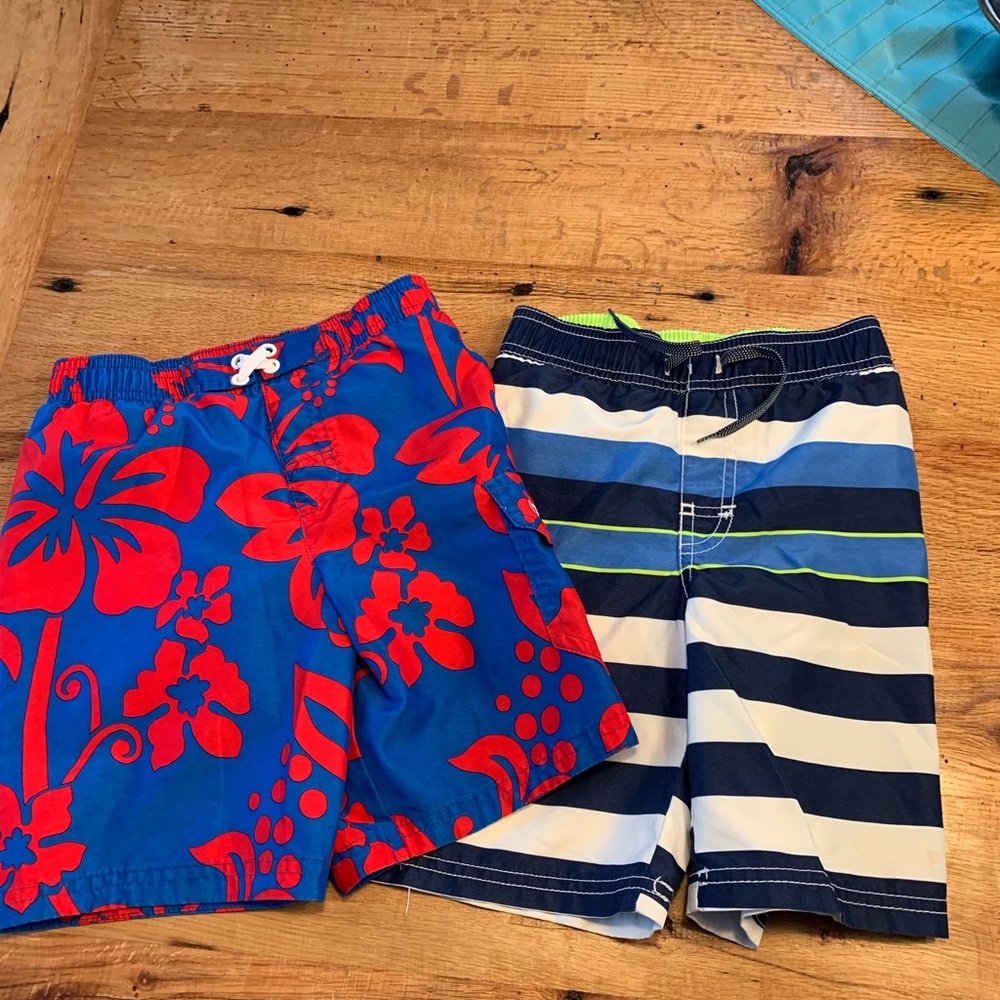 Two boys bathing suits.